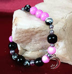 Schwarzer pinkfarbener Ball • ARMBAND